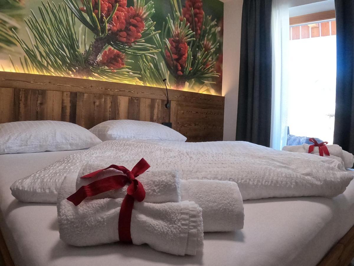 Mas Dei Masi Hotel Cavalese Bagian luar foto